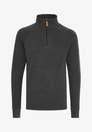 Tumma harmaa neule pystykauluksella, jossa on puolivälin vetoketju ja kapeat hihat peukaloaukoilla, valmistettu teksturoidusta kankaasta.