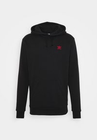 Svart fleecehuva med långa ärmar, dragsko i huvan och en framficka. Har en liten röd Adidas-logotyp på bröstet.