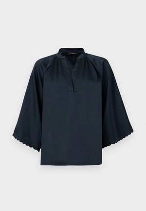Blusa blu navy con una morbida texture satinata, scollatura a V e maniche larghe e ondulate. Design ampio per il massimo comfort.