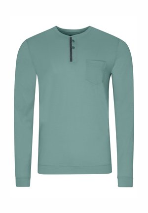 Langarmhemd in Meeresgrün aus weichem Stoff. Verfügt über einen Rundhalsausschnitt, eine Knopfleiste mit drei Knöpfen und eine Brusttasche. Einfaches Design.