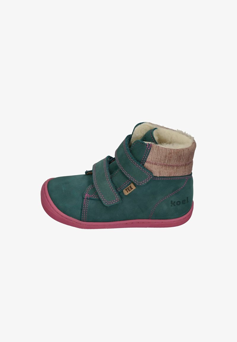 Turquoise suede ankle boots with pink rubber soles, two Velcro straps, and a wool lining, featuring a beige textured collar and brand label.