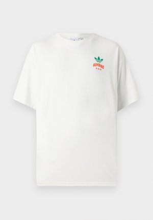 White cotton t-shirt with short sleeves, round neck, featuring a green and orange "ADIDAS" logo on the left chest area.