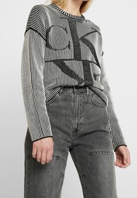 Calvin Klein Jeans Stickad tröja - black