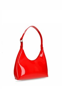 Red patent leather handbag with a curved silhouette, a single adjustable strap, and a smooth, glossy finish. No visible hardware details.