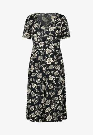 Zwarte bloemenjurk gemaakt van lichtgewicht stof. Voorzien van korte mouwen, een V-hals en een getailleerde taille met een uitlopende rok, gedetailleerd met crèmekleurige bloemen.