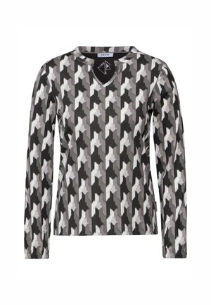 Top de manga larga con un patrón de pata de gallo en tonos de negro, gris y blanco, con escote en V y una textura de tela suave.