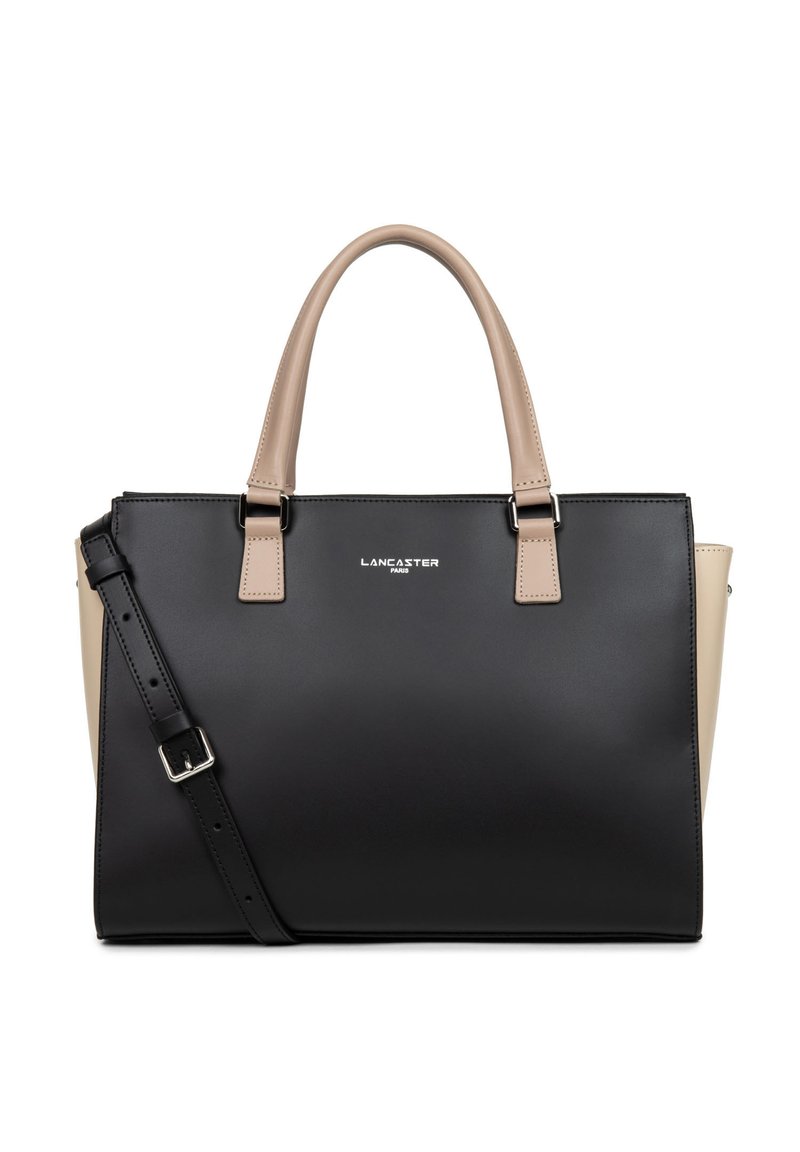 Sac fourre-tout noir et beige en matériau synthétique, forme structurée, doubles poignées supérieures, bandoulière amovible et affichage décoratif du logo.