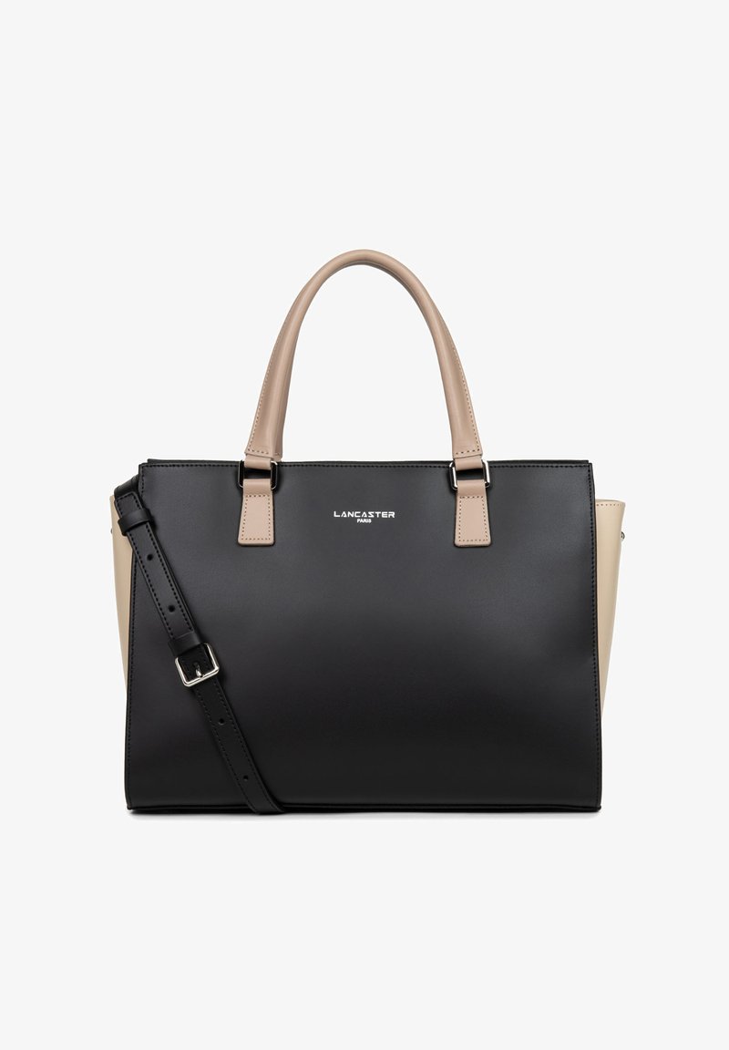 Sac fourre-tout noir et beige en matériau synthétique, forme structurée, doubles poignées supérieures, bandoulière amovible et affichage décoratif du logo.