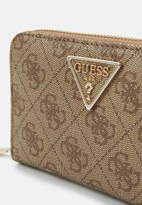 Guess LAUREL beżowy