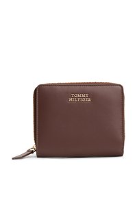 Brown leather zip wallet with gold-tone "TOMMY HILFIGER" logo, rectangular shape, smooth texture, and zippered closure for secure access.