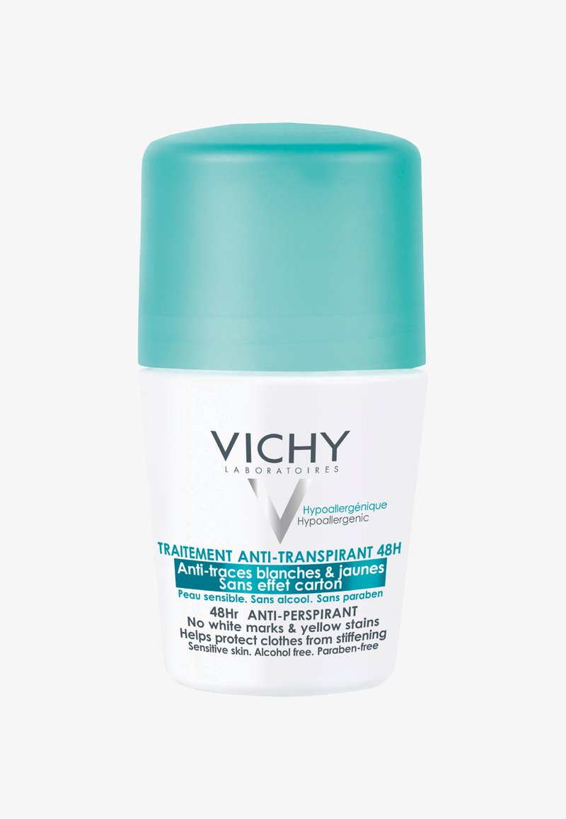 Weißes Roll-on-Deodorant mit einem türkisfarbenen Deckel und einer glatten Kunststoffoberfläche. Das Etikett enthält Produktdetails in Französisch und Englisch.