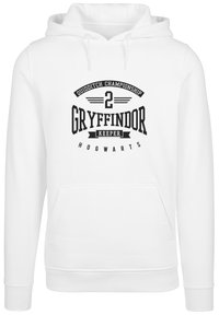 Hvid hoodie med en frontlomme og en sort grafisk tryk, der står "Quidditch Championship 2 Gryffindor Keeper Hogwarts."
