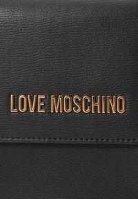 Love Moschino SIGNATURE - Phone pouch - nero