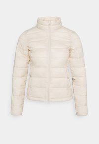 Lehká vycpaná bunda v krémové barvě s vysokým límcem, plným předním zipem a horizontálním prošíváním. Obsahuje boční kapsy.