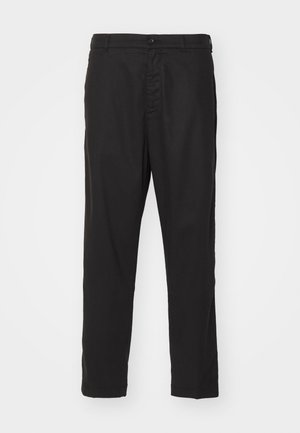 Black cotton chinos with a straight leg design, button closure, and side pockets. Smooth texture and no visible patterns or accents.