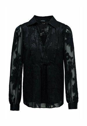 Blusa negra de manga larga con tela transparente y patrones florales bordados, escote en V y detalles plisados.