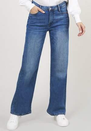 JUDY - Flared Jeans - stone