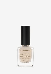 Korres Gel Effect Nagellack i en klar glasflaska med ett svart lock. Innehåller ljus beige nagellack med söt mandelolja. 11 ml.