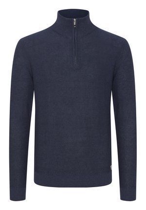 Tamno plavi pleteni džemper s visokim ovratnikom i četvrtim patentnim zatvaračem, s rebrastim manžetama i rubom, napravljen od teksturirane tkanine.