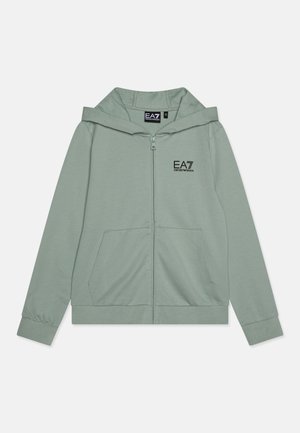 Haut de hoodie zippé vert clair en tissu doux. Comprend une poche avant, des poignets côtelés et un petit logo EA7 sur la poitrine.