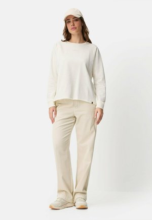 - Spodnie materiałowe