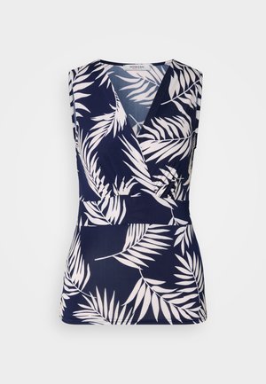 Navy blue sleeveless top with a wrap design, featuring white tropical leaf patterns, a smooth texture, and a v-neckline.