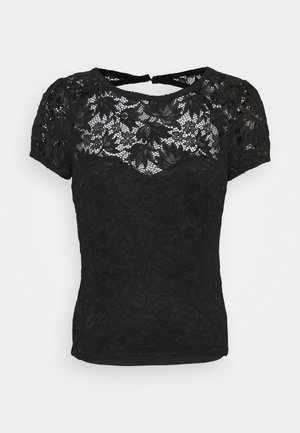 Czarna koronkowa bluzka z krótkim rękawem, z kwiatowymi wzorami, przezroczystą górną częścią na klatce piersiowej i rękawach oraz małym wycięciem w kształcie klucza na karku.