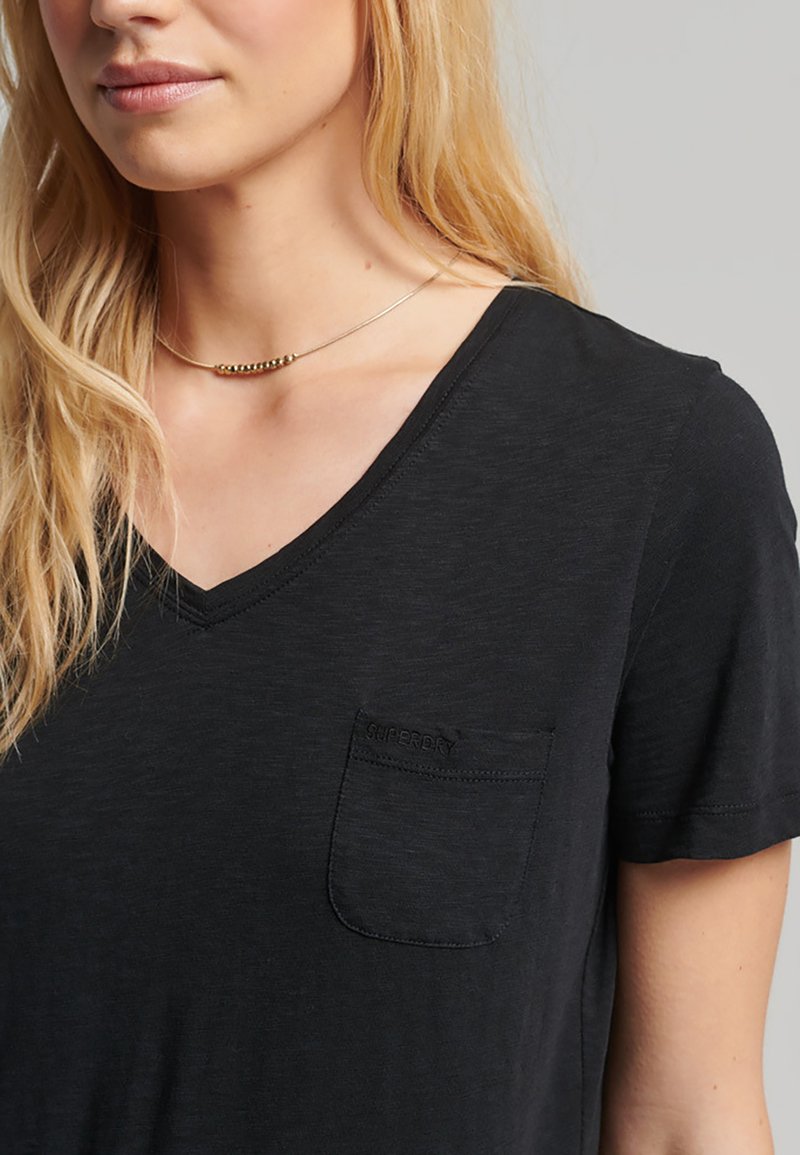 Superdry STUDIOS POCKET V NECK TShirt print black/schwarz Zalando.de