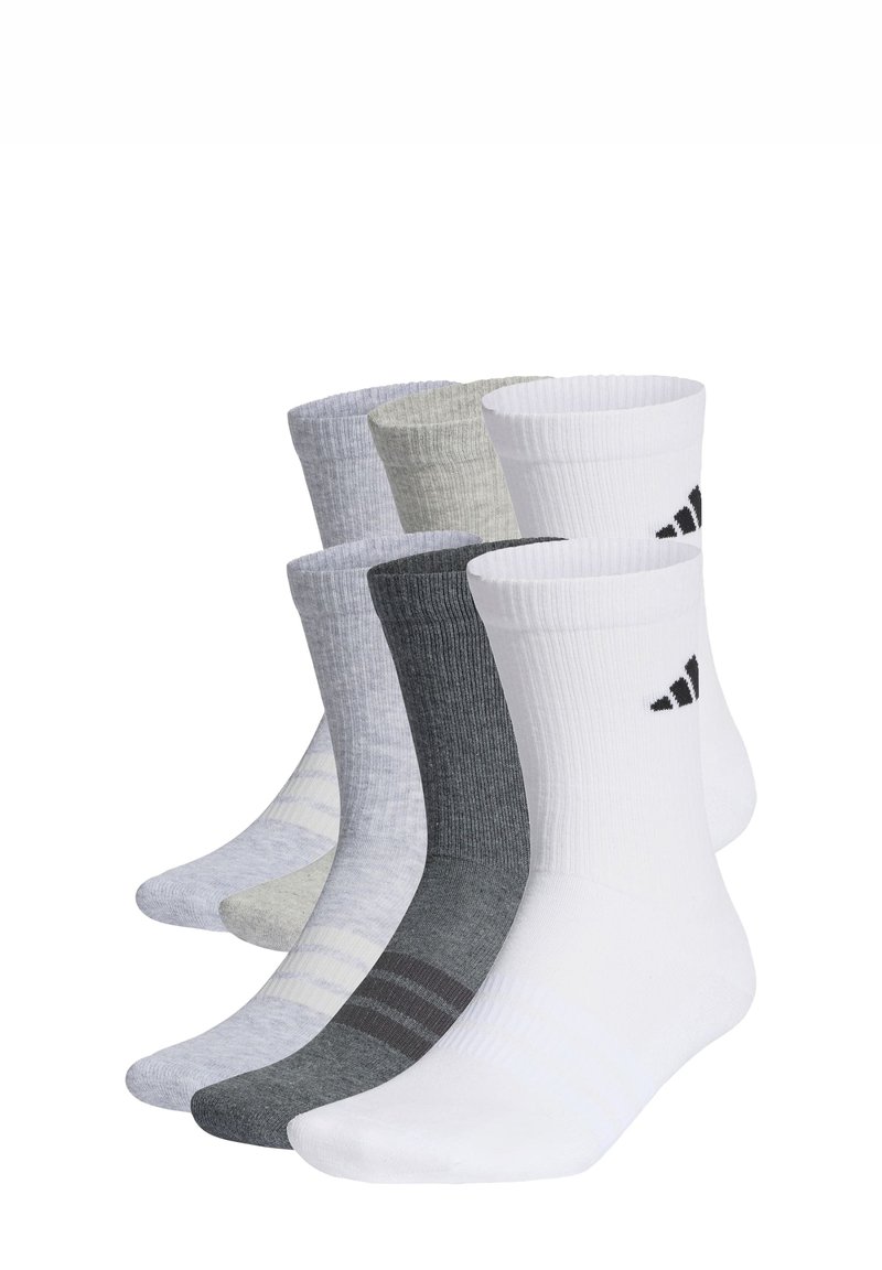 Set di quattro paia di calzini in tonalità grigio, bianco e nero. Presentano un design a coste, sfumature varie e il logo Adidas sui calzini bianchi.