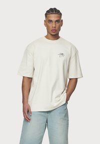 Pegador GORET TEE - Potiskana majica - washed salty cream