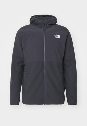 Czarna bluza z kapturem zapinana na zamek, wykonana z lekkiego materiału o gładkiej fakturze. Posiada boczne kieszenie oraz logo na klatce piersiowej.