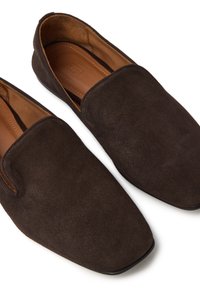 Brown suede slip-on shoes with a pointed toe design and leather insole, featuring minimal stitching and a smooth texture.