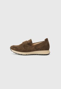 Brown suede slip-on shoes with a moccasin design, textured upper, and a contrasting beige rubber sole. Features subtle stitching accents.