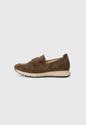 Brown suede slip-on shoes with a moccasin design, textured upper, and a contrasting beige rubber sole. Features subtle stitching accents.