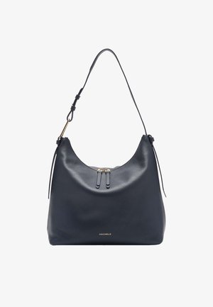 Sac à épaule en cuir bleu marine avec une finition texturée, une forme incurvée, une fermeture zippée sur le dessus et des accents en métal doré. Logo de la marque visible.