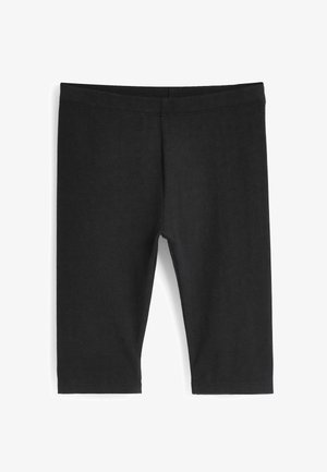 Juodos leggingai, pagaminti iš tamprus mišinio medvilnės, su elastingu liemens juostele ir iki blauzdos ilgiu. Sklandus paviršius, be raštų ar akcentų.