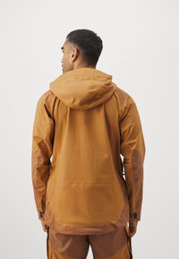 Klättermusen BRAGE JACKET - Jachetă schi - mustard