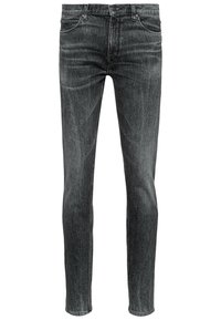 Černé džínové kalhoty se slim fit střihem, s jemně vybledlým vzorem, tradičním čtyřiceti kapsovým designem a prošívanými detaily podél švů.