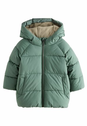 Veste d'hiver matelassée verte avec capuche, fermeture éclair frontale et poches latérales, avec une doublure douce beige à l'intérieur de la capuche.