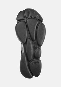 Black rubber shoe sole with a textured surface featuring rounded traction patterns and logo detail, labeled with size 38.