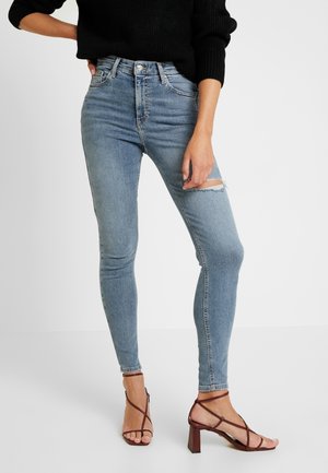 Skinny džíny - bleached denim