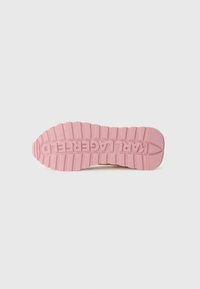 Pink rubber sneaker sole featuring a textured, ridged pattern and "PALLADIUM" lettering embossed across the center.