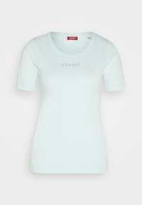 T-shirt bleu clair à manches courtes en coton doux avec un col rond. Présente un logo « ESPRIT » subtil en strass à l'avant.