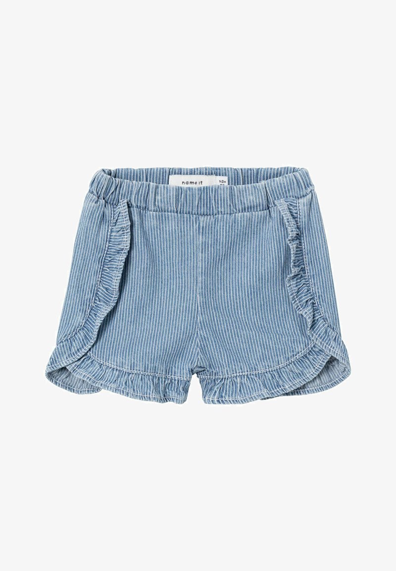 Pantaloni corti a righe blu e bianche con orlo arricciato, vita elastica e una morbida texture di cotone. Etichette visibili all'interno della cintura.