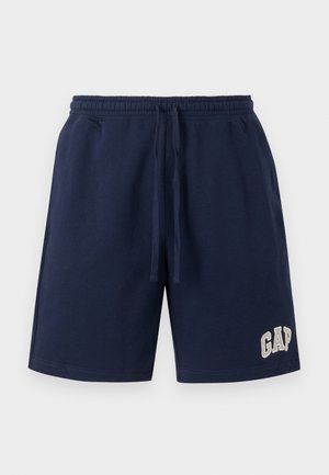 Granatowe szorty z troczkami, elastycznym pasem i haftowanym logo "GAP" na dolnej lewej nogawce.