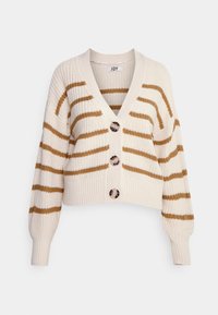 Kerman neulecardigan, jossa on ruskeat vaakaraitat, kolme suurta kilpikonnakuorista nappia ja V-mallinen kaula-aukko.