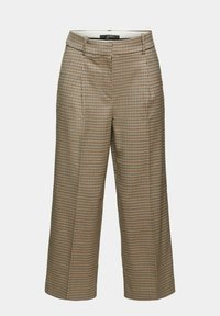 Rutig vida byxor i brunt, krämfärgat och svart. Skärning med framvik och sidofickor, samt midjeband för en säker passform.