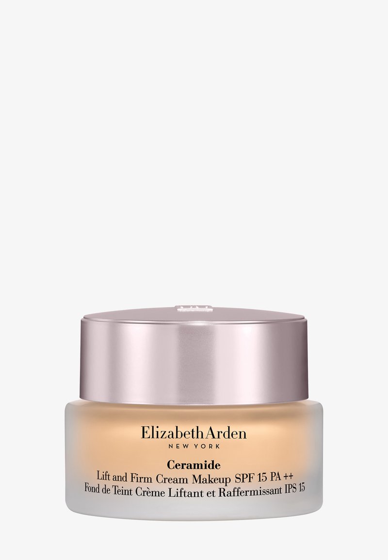 Elizabeth Arden Ceramide Lift and Firm Cream Makeup with SPF 15 in a frosted jar and metallic lid.