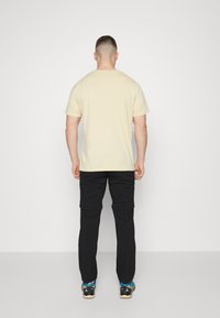 Jack Wolfskin GLASTAL ZIP OFF PANTS 2-IN-1 - Pantaloni outdoor - black