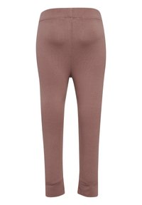 Bruine leggings gemaakt van zacht, rekbaar materiaal. Heeft een brede tailleband en een aansluitend ontwerp van de benen, dat eindigt op halverwege het onderbeen met stiksel-details.